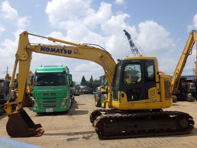 máy xúc bánh xích KOMATSU 128US-10